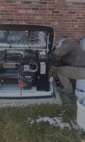 repairman working on generator